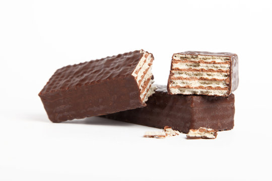Wafers with chocolate on white background