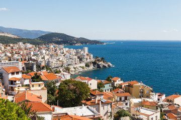 Naklejka na ściany i meble Aerial panoramic view of Greek resort Kavala, big port with old fortress and old town