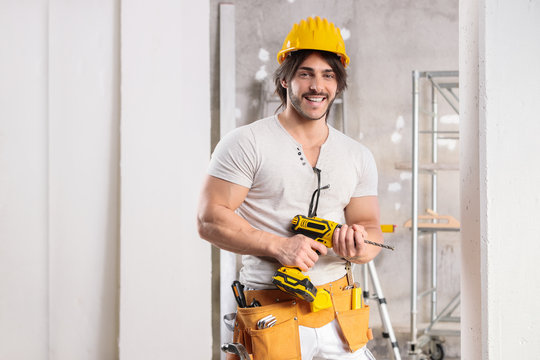 Muscular builder with a friendly smile