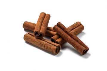 cinnamon sticks isolated on white