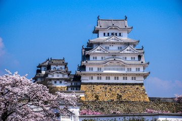 Majestic white castle in traditional japanese style filmed in many Hollywood movies placed in Himeji, Japan