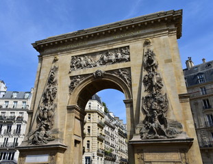 Fototapeta na wymiar Porte Saint Denis, triumphal arch erected by Louis XIV. Paris, France.