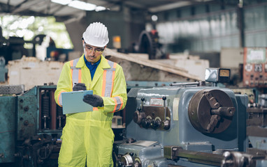 profession technician engineer checklist process  heavy machine  in factory