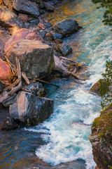 Fall landscape with mountain river and forest