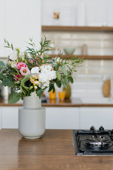 Fototapeta na wymiar Flower vase in kitchen