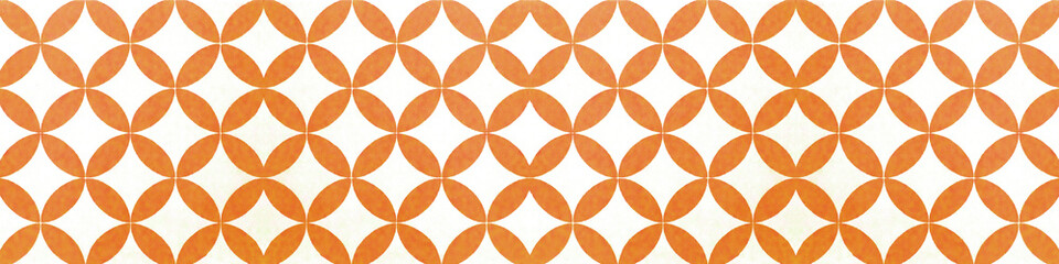 Old orange white vintage shabby patchwork motif tiles with circles round oval rhombus diamond ptint stone concrete cement wall texture background banner panorama