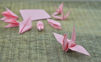 Obraz na płótnie Canvas A made origami paper crane folding