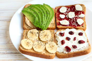 Toasts with avocado for breakfast, healthy breakfast on the table