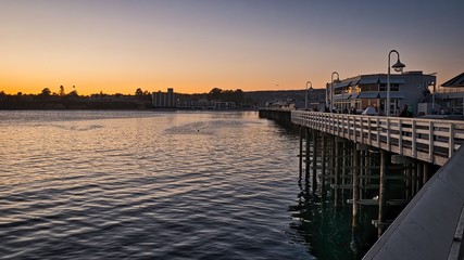 Fototapeta premium Dusk over Capitola Wharf. Capitola, Santa Cruz County, California, USA.