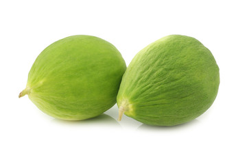 two fresh cumelo's (mix between a cucumber and a melon) on a white background