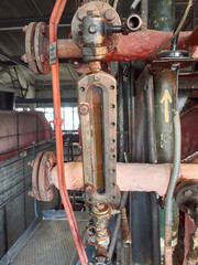 Water-indicating glasses of the operating steam boiler in the boiler house.Steam boiler