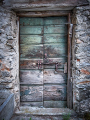 old wooden door with wooden shutters
