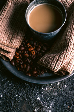 Coffee and coffee grains on tray