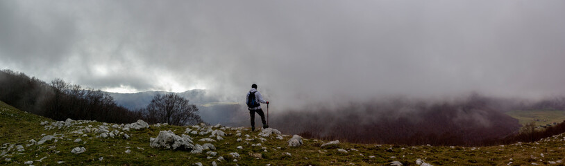 hiker on the top of a mountain