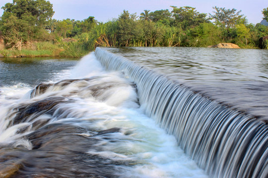 A check dam in tamirabarani river overflowing with water in tamilnadu india