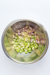 Salty muffin in the making. White background