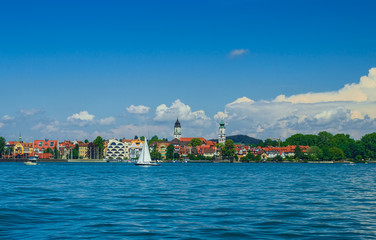 Lindau embankment on a Sunny day. Boats on lake Constance. Germany. Soft focus, blurry background.