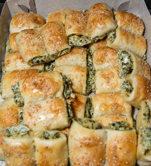 Puff pastry rolls with spinach and ricotta