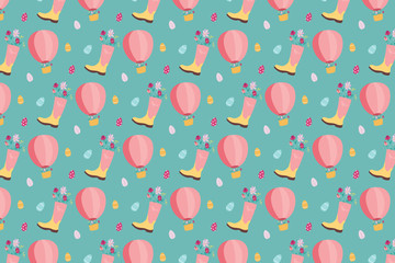 Spring background. Flowers in the pink rubber boot and air hot balloon.