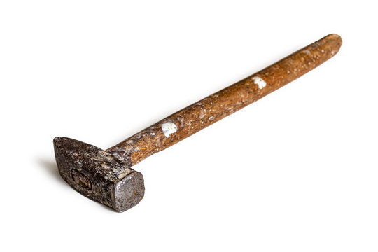 Old, battered hammer with paint stains on the wooden handle