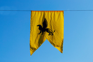 yellow chimera banner with blue sky in the background