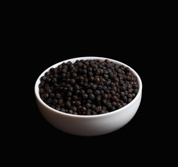 Fresh black cambodian pepper corn in bowl, cooking preparation