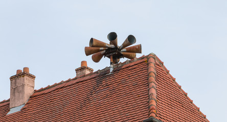 Siren alert to populations on the roof of a house