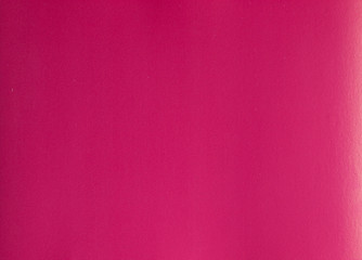 Bright colorful crimson colored cardboard texture.