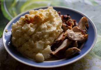 full plate of food, potatoes with meat