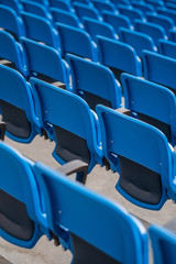 empty stadium chairs - games without fans