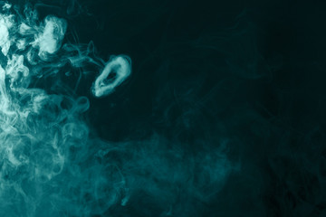 Smoke. Cloud of vapor. Dark blue background