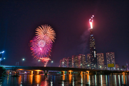 High resolution image of colorful fireworks of Ho Chi Minh City at new year 2020 view from Landmark 81 riverside.