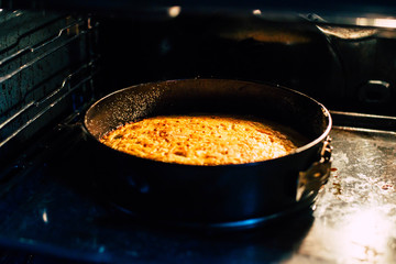 Apple pie in an old dirty oven