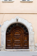 Old wooden door, facade of building.