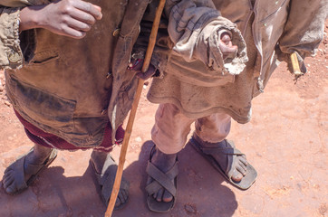 Children wearing rags and begging by the road in rural Tanzania 