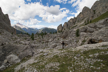 Woman's crossing via via ferrata in the alps