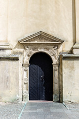 Old wooden door, facade of building.