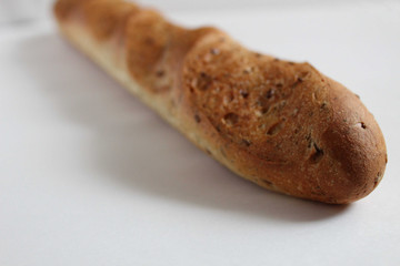 the baguette is on the table on a white background with space for text
