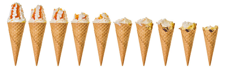 set ice cream in a waffle cone, different stages of eating.