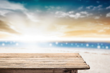 Obraz na płótnie Canvas Empty wooden desk space platform on Beach side with sunrise morning summer concept for product presentation