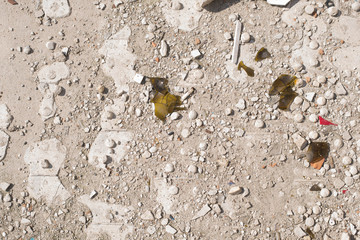 Glass from broken bottle on the ground
