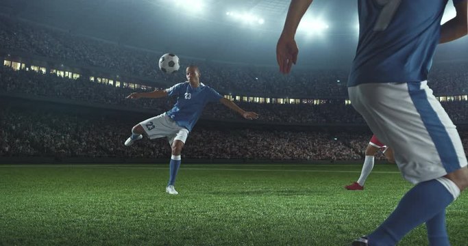 Soccer player shows great skills during the game on a professional soccer stadium. Stadium and crowd are made in 3d and animated.