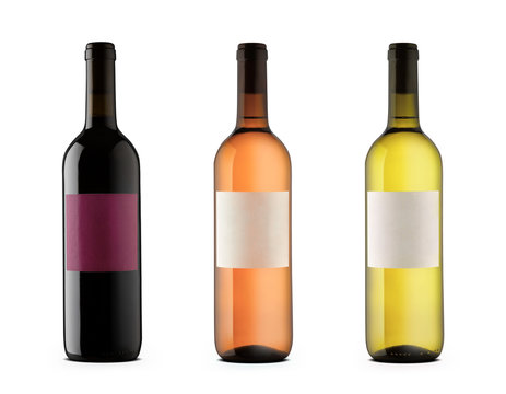 Three wine bottles with blank labels of red, rose and white wine