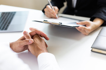 Employer or HR department is reading the resume and interviewing the ability of new employees, Employer is selecting job applicants, Employment and Recruitment Concept.