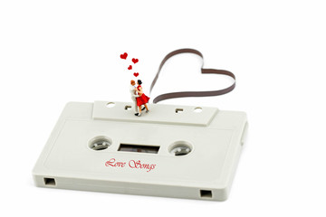 miniature couple dancin on  a Music cassette
