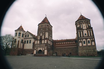 Fototapeta na wymiar The courtyard of the Mir Castle in cloudy weather