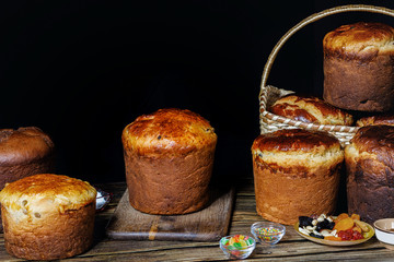 Cooked Easter cakes on a wooden table .