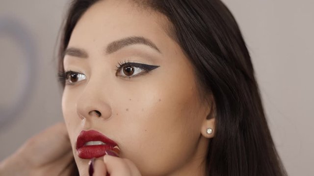 Makeup Artist Complete Make-up for Asian Woman
