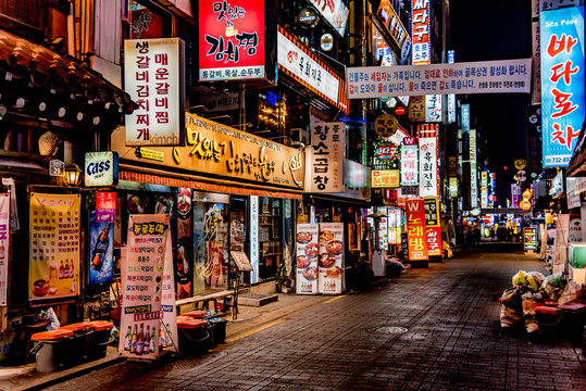 Naklejki Neon lights in the night of the city of Seoul in South Korea