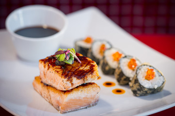 Grilled Salmon with Sushi Roll